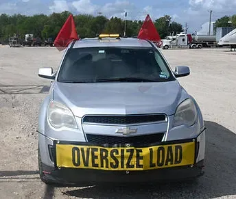 CLS pilot vehicle prepared for an oversize load escort